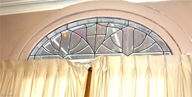 Above front double door entry