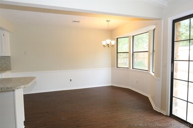 Breakfast nook with bay window has tons of natural