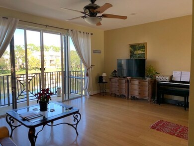 Living room has hard wood floors and a view of the