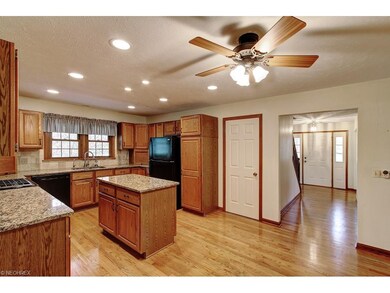 kitchen view towards the front entry way and the d