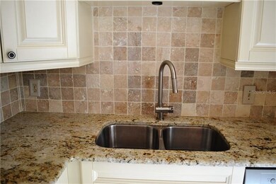 Custom Backsplash with dual sink and updated fauce