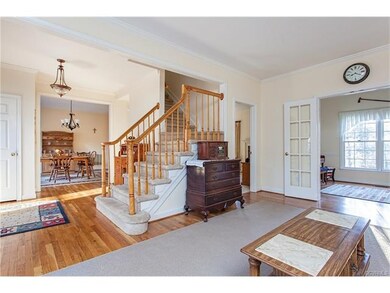 French doors lead to office or music room.
