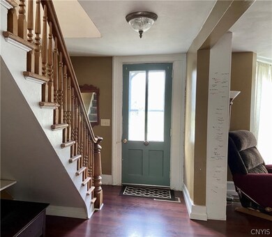 Entry Hall: Much of the original millwork remains.