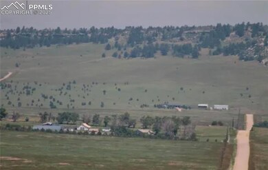 Property view of mountains featuring a rural view