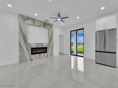 Unfurnished living room featuring recessed lightin