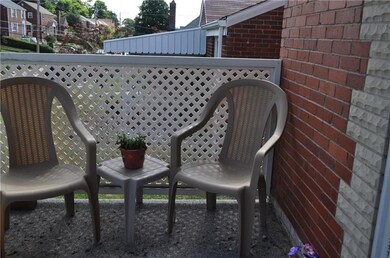Lovely front porch to enjoy your morning coffee!