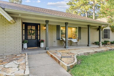 Gorgeous iron door graces the front entrance