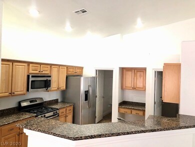Kitchen/ door to walk-in-pantry / door to laundry