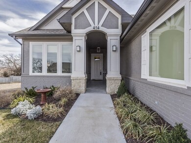 Wonderful Landscaping Around this Low Maintenance 