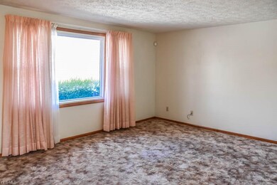 Living room with large picture window.