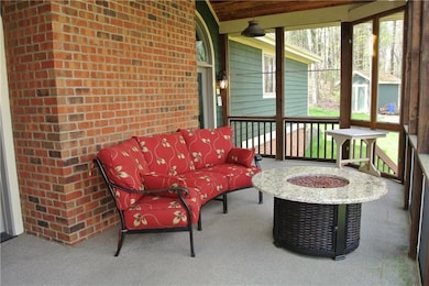 Enclosed porch off the great room, spectacular vie