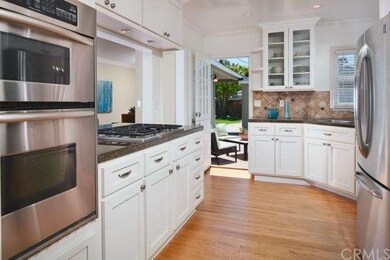 Kitchen has a custom Dutch Door to the rear yard .