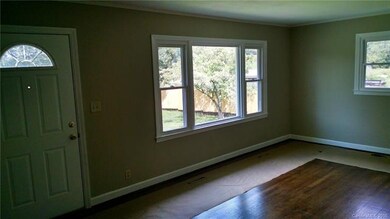 Living room with refinished wood floor
