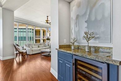 A wine cooler can be found just inside the front e