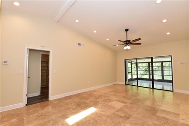 LARGE FLORIDA ROOM OFF THE LIVING ROOM.
