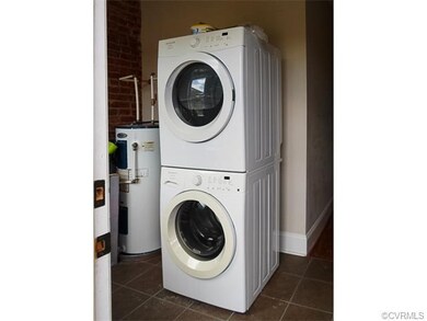Full size washer and driver in the Mud room at bac