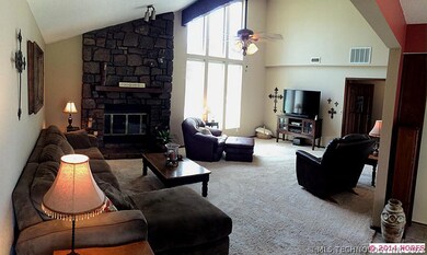 Spacious family room with vaulted ceiling, new lig
