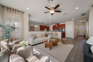 Living area with light wood-style flooring, reces