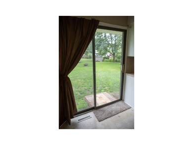 Kitchen door leading to backyard