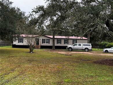 Back of home is fenced in with approx a 1/4 acre i