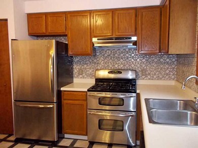 Kitchen. Ceramic tile backsplash makes everything 