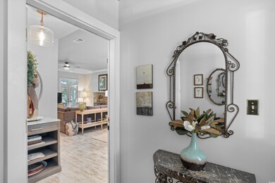 Corridor featuring crown molding