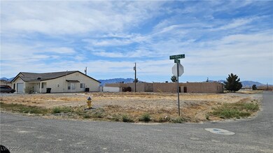 View of road with a mountain view and traffic sign