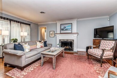 Spacious living room with windows on front and bac