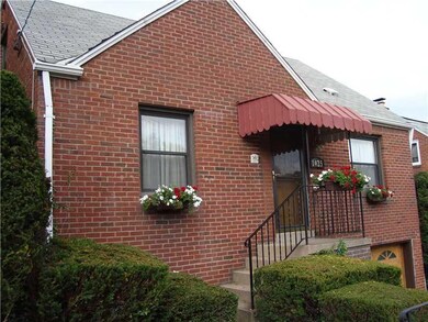 Exterior Front. Beautifully-maintained landscaping