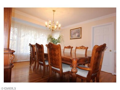 Dining Room - THE FORMAL DINING ROOM HAS BRIGHT WI