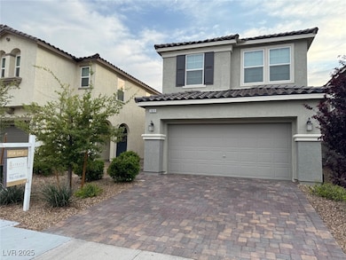 View of front of home featuring an attached garage