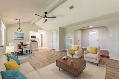 Very spacious living room with high vaulted ceilin