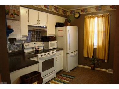 COZY KITCHEN COMES WITH STOVE AND REFRIGERATOR!