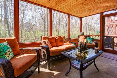 Screened porch with ravine view