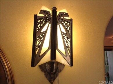 Art deco light fixtures in living room.