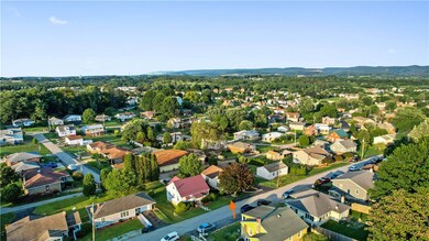 Aerial View of Neighborhood Pointing to Front of P