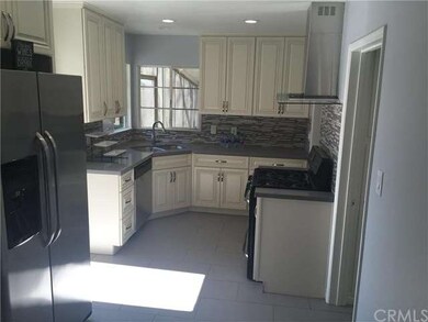 Remodeled kitchen with new quartz countertops, new
