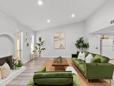 Living room featuring light hardwood / wood-style 