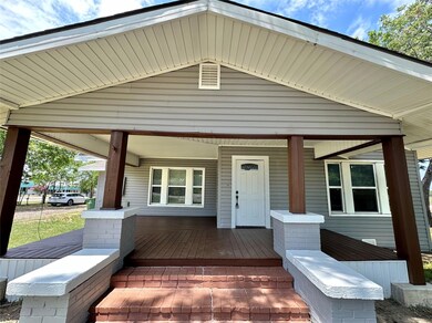 View of front of property with a porch