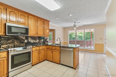 Kitchen with stainless appliances and granite coun