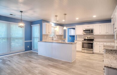 UPDATED/RENOVATED KITCHEN will be the heart of you