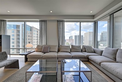One of two living spaces, this room sits between the dining room and the kitchen.