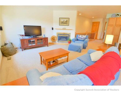 Living Room. Large living area with gas fireplace.