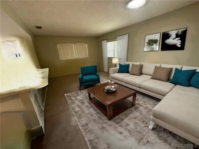 Virtually staged - Family room overlooking the kit