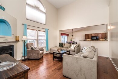 Open Floor Plan. 2 Story Family room with a gas fi