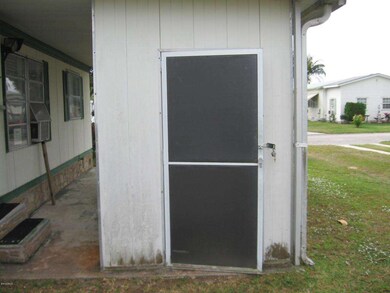 Shed under carport