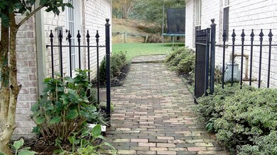 walkway between home and detached bldg.