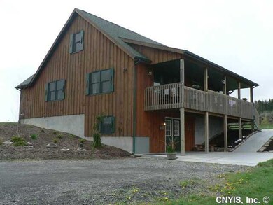 Exterior Front side view with landscaping