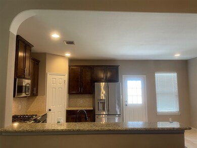 Open kitchen to the Living Room - ALL upgraded appliances!