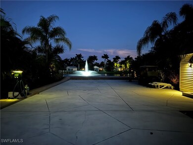 View of pool at dusk